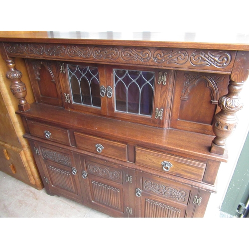 648 - C20th oak dining suite comprising: refectory style table, rectangular top on carved bulbous end supp... 