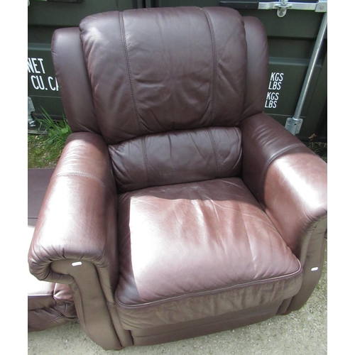 650 - Brown leather three piece suite comprising: three reclining seat and two reclining seat sofas and an... 