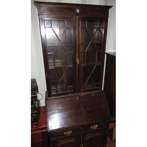 652 - Edwardian mahogany bureau bookcase, two astragal glazed doors above, slope fall front and two drawer... 