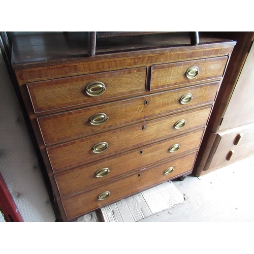 657 - C19th mahogany crossbanded oak chest of two short and four long graduated drawers with oval brass ha... 