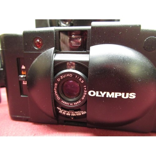 159 - Five Olympus XA2 pocket cameras, some with flash