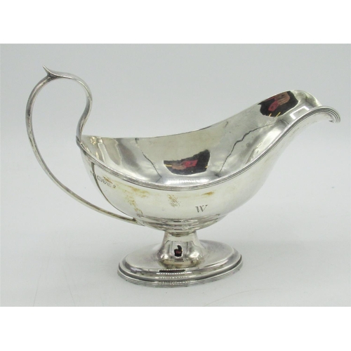 1184 - Geo.V hallmarked sterling silver gravy boat, on oval stepped pedestal base initialed W, by Stokes & ... 