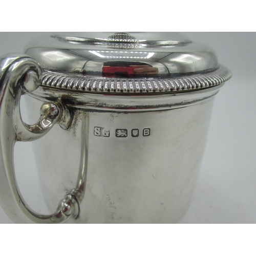 1168 - Geo.V hallmarked sterling silver twin handled cup,  stepped cover with gadrooned rim and finial, scr... 