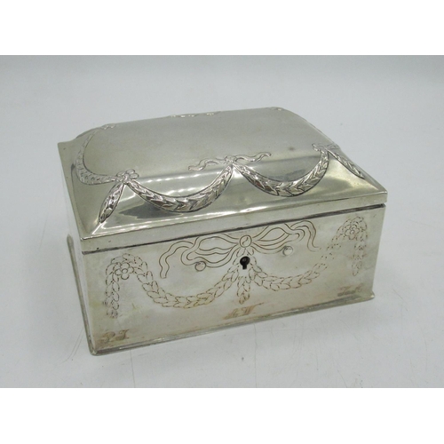 1169 - Early C20th Continental silver rectangular jewellery box, engraved and repoussé decorated with swags... 