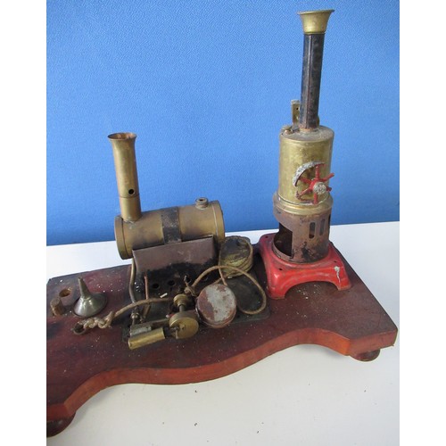 586 - Brass live steam stationary engine, 15cm cylindrical boiler with twin wick burner, another similar w... 