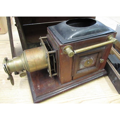 187 - Early C20th mahogany and brass magic lantern projector with box of slides