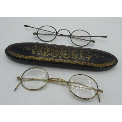 189 - Pair of early C19th white metal spectacles, similar period papier mache spectacles case, pair of rol... 