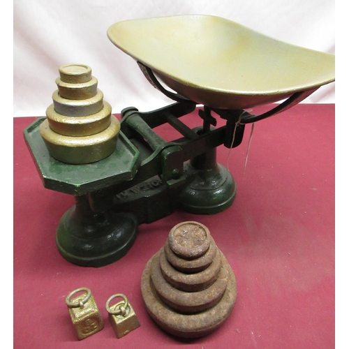 192 - C20th cast iron and brass painted kitchen scales with two sets of graduated weights