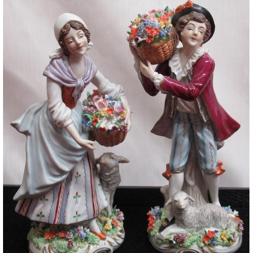 196 - Pair of C20th Sitzendorf porcelain figures of lady and gentlemen flower sellers, each wearing C18th ... 