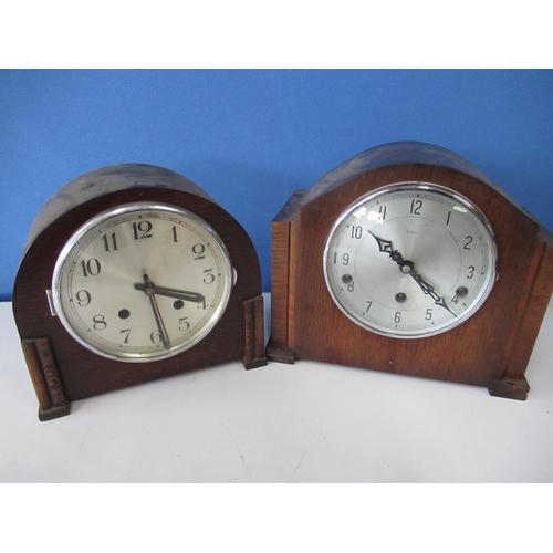 602 - Victorian black slate mantel clock with circular Roman dial, twin train movement striking the half h... 