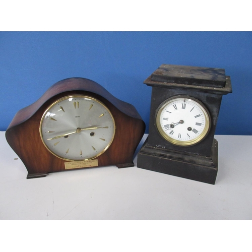 602 - Victorian black slate mantel clock with circular Roman dial, twin train movement striking the half h... 