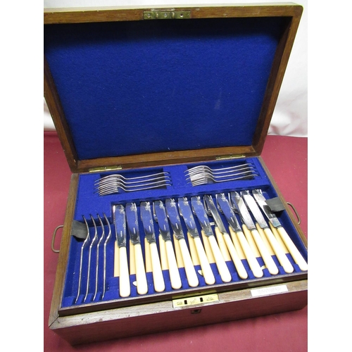 681 - Oak cased twelve place silver plated canteen of cutlery with faux handles by George Butler and Co, C... 