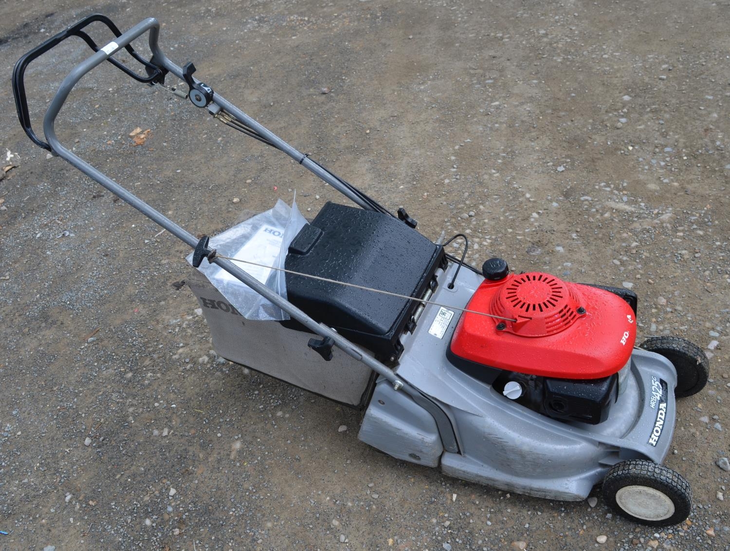 Honda petrol cheap mower with roller