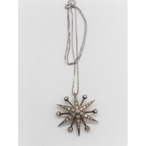 1128 - Victorian diamond star brooch, round cut diamond arranged in a white metal mount,  screw socket for ... 