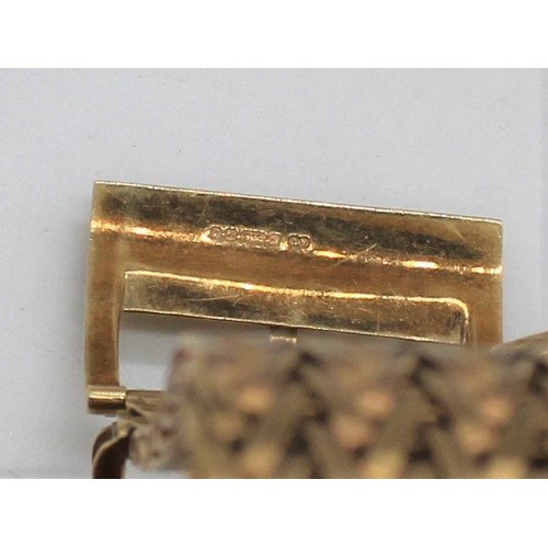 1110 - Hallmarked 9ct yellow gold watch strap style bracelet cuff with buckle clasp, by AJ, Birmingham, 197... 