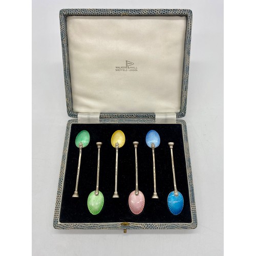 1185 - Cased set of six ERII hallmarked sterling silver seal top coffee spoons with multicolored enamel bac... 