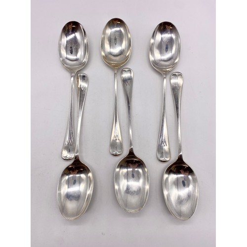 1160 - Set of six Geo.V  hallmarked Sterling silver Old English Pattern table spoons initialled W, by North... 