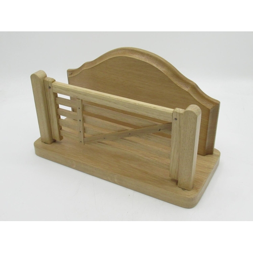 1435 - Yorkshire Oak Craftsman - an oak letter rack in the form of a five bar field gate, with arched back,... 