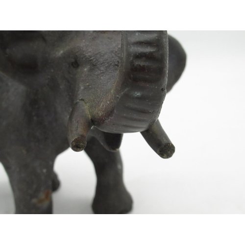 1222 - Pair of small Japanese hollow patinated bronze models of elephants with bronze tusks, both standing,... 