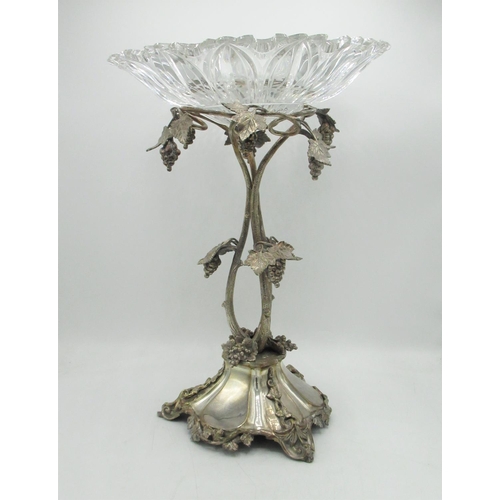 1180 - Victorian EPNS table centre, cut glass circular bowl on open vine work support cast with grape bunch... 