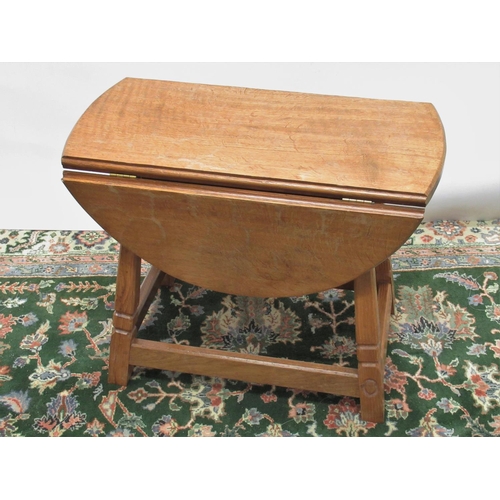 1429 - Alan Acornman Grainger of Brandsby - an oak oval drop leaf coffee table on out splayed square tapere... 