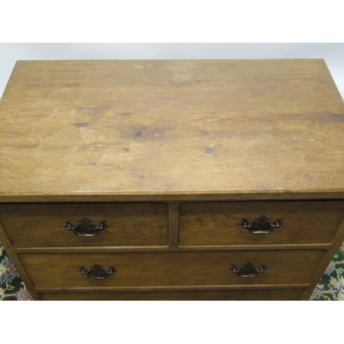 1416 - Alan Acornman Grainger of Brandsby - an oak chest of two short and three long drawers with brass swa... 