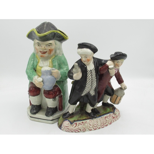 1254 - C19th Staffordshire Drunken Parson group, on scroll painted oval base, H22.5cm with castle of Fiddes... 
