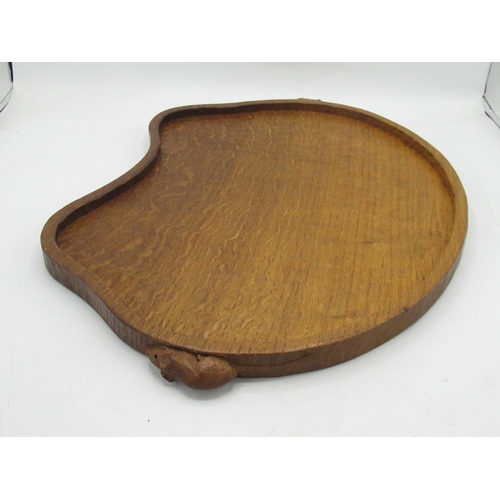 1418 - Robert Mouseman Thompson of Kilburn - an adzed oak kidney shaped galleried tray, carved with two sig... 