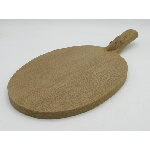 1427 - Robert Mouseman Thompson of Kilburn - an adzed oak oval cheese board, curved handle carved with sign... 