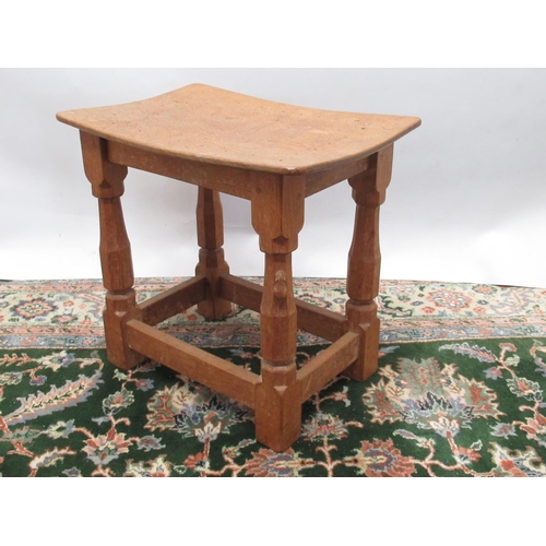 1424 - Robert Mouseman Thompson of Kilburn - an oak joint type stool, adzed dished top on octagonal baluste... 