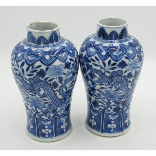 1243 - Pair of Chinese late C18th-early C19th blue and white baluster vases, bodies decorated with four toe... 