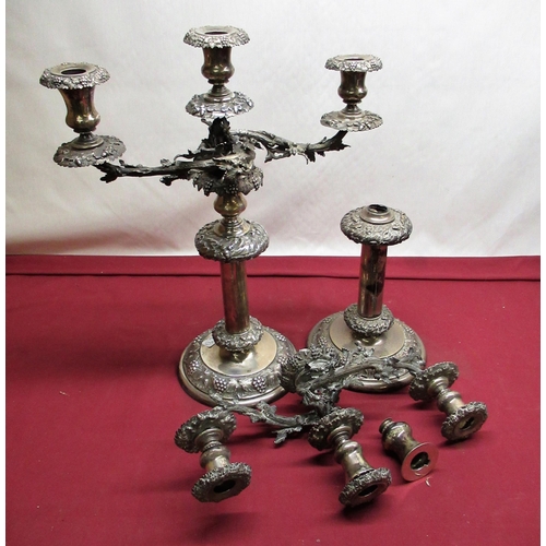 1146 - Pair of large Victorian Country House hallmarked sterling silver three light table candlesticks, the... 