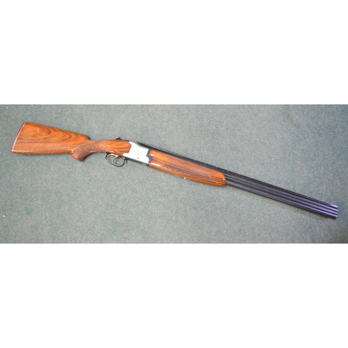 333 - Cased Laurona over and under double barrelled double trigger shotgun, engraved metalwork to body, ba... 