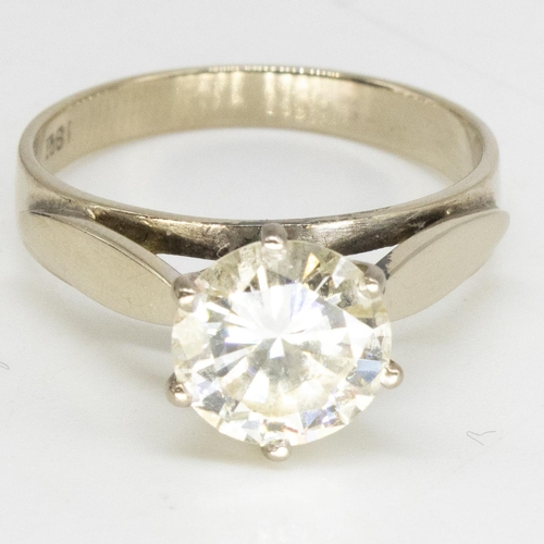 1101 - 18ct white gold diamond solitaire ring, round cut diamond diameter approx.8mm,  claw set on stylised... 