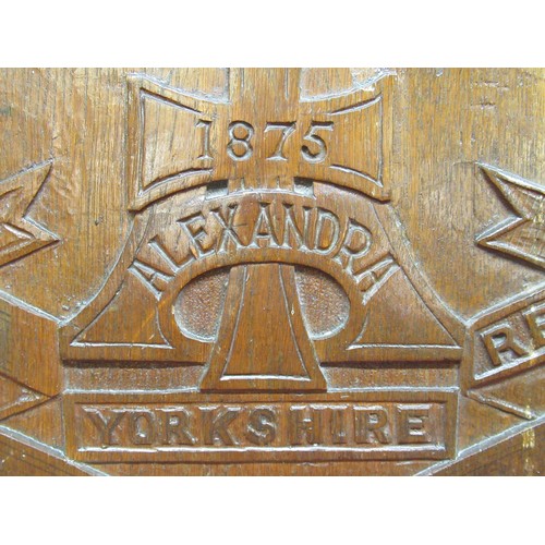 1059 - C20th carved oak shield shaped wall plaque for The Prince of Wales Yorkshire Regt. part finished, H5... 