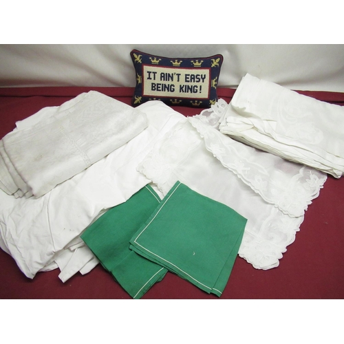 1383 - Seven mesh rectangular arm covers, set of eleven green napkins, cushion with slogan “It ain’t Easy B... 