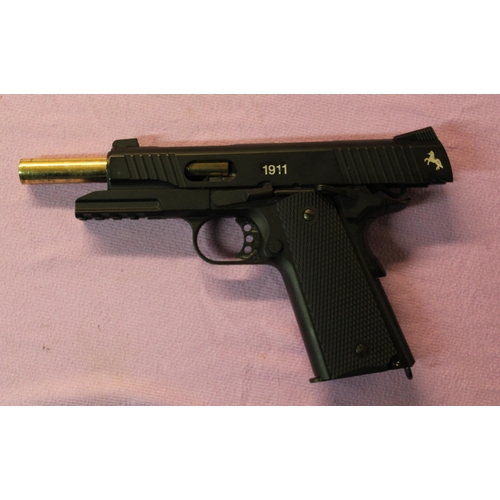 187 - Umarex Colt 1911 black custom metal semi-automatic CO2 powered air pistol, boxed with accessories. B... 