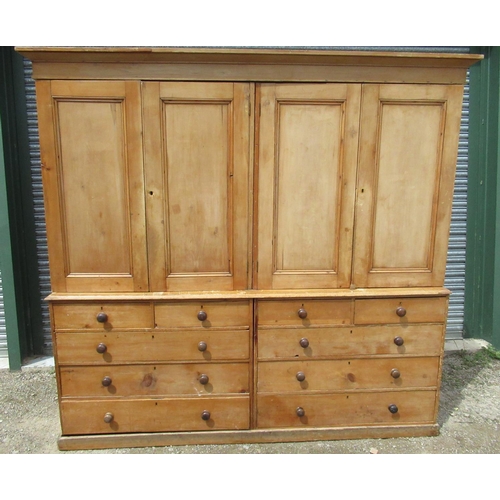 1441 - Large Victorian waxed pine housekeepers cupboard, moulded cornice above four panel doors with fitted... 