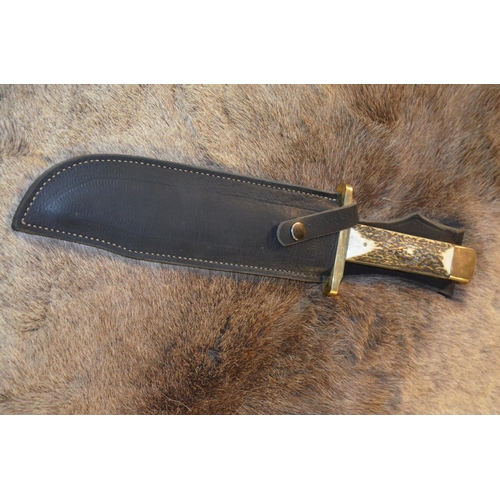 164 - Extremely large Harry Boden bowie knife with clip blade, tooling to the back, large brass handguard,... 