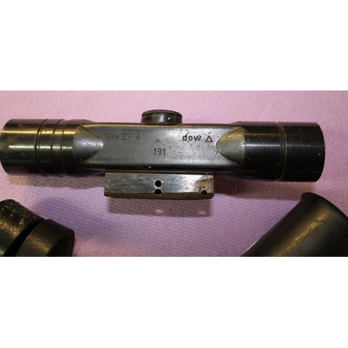 67 - A vintage Parker Hale rifle scope with covers.