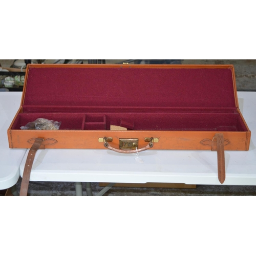 295 - Rectangular light brown leather gun case with burgundy felt interior