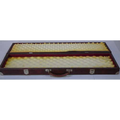 298 - Brown rectangular gun case with yellow foam interior