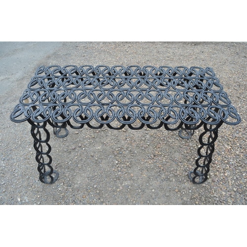 1480 - Hand crafted rectangular garden table constructed from used horse shoes, L136cm W64cm H76cm