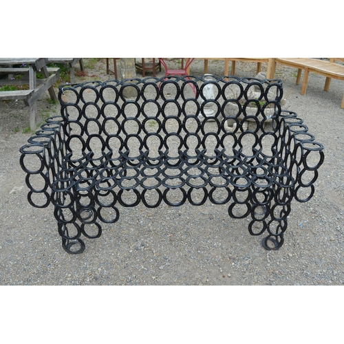 1482 - Hand crafted garden bench constructed from used horse shoes, approx W170cm D50cm H100cm
