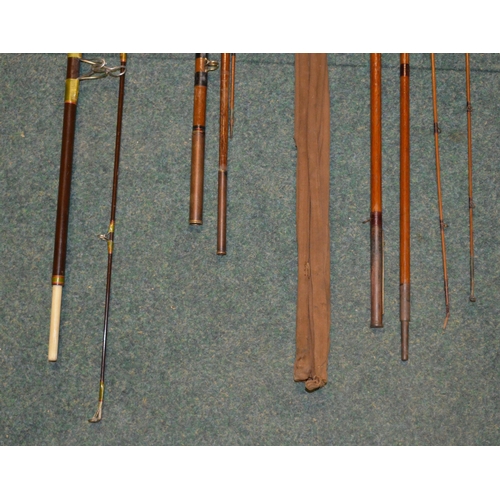 113 - Three vintage rods, two split canes and an early Hardy carbon fibre light two handled general purpos... 