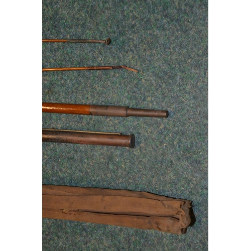 113 - Three vintage rods, two split canes and an early Hardy carbon fibre light two handled general purpos... 