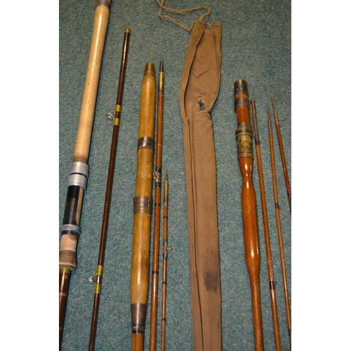 113 - Three vintage rods, two split canes and an early Hardy carbon fibre light two handled general purpos... 