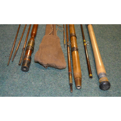 113 - Three vintage rods, two split canes and an early Hardy carbon fibre light two handled general purpos... 