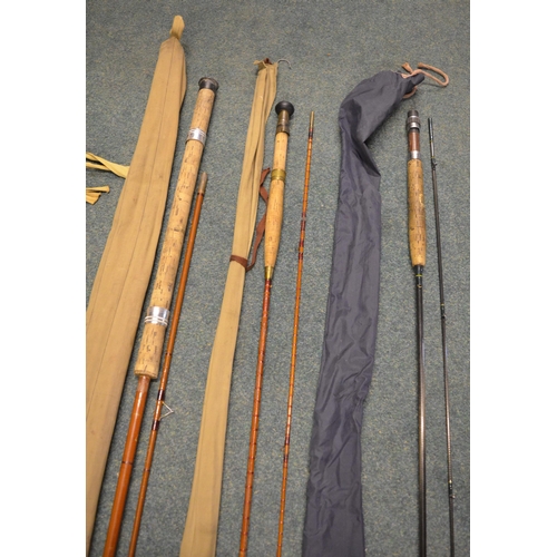 116 - Three fishing rods, one vintage unbranded early carbon fibre two piece general purpose cork handled ... 