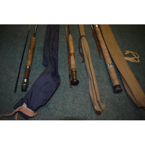 116 - Three fishing rods, one vintage unbranded early carbon fibre two piece general purpose cork handled ... 